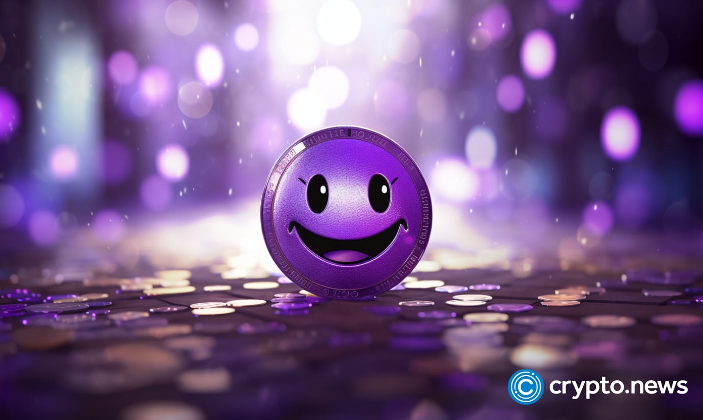 crypto news purple coin with happy face blurry blockchain backgroun v5.2